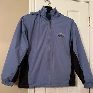 Large women's warm winter reversible jacket from Skagway Alaska. Zip off hood